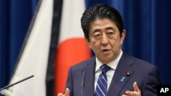 FILE - Japanese Prime Minister Shinzo Abe in Tokyo, March 10, 2016. 