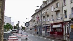 Ties between Calais and Britain stretch back decades. Pictured is one of many British flags dotting the city. (L. Bryant/VOA)