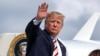 U.S. President Donald Trump waves as he boards Air Force One at Morristown municipal airport en route to Washington after a weekend in Bedminster, New Jersey, Aug. 4, 2019.