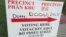 Un cartel en varios idiomas indica a los votantes donde emitir sus votos en las elecciones primarias en Houston, Texas, el martes, 1 de marzo de 2016.