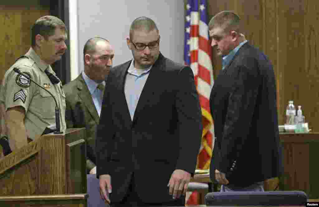 Eddie Ray Routh, center, takes his seat for a pretrial motion hearing in Stephenville, Texas, Feb. 10, 2015. The military veteran is accused of the fatal shooting of former Navy SEAL Chris Kyle.