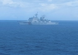 FILE - This undated file photo released on Sept. 15, 2020, by Indonesian Maritime Security Agency (BAKAMLA) shows a Chinese Cost Guard ship sails in North Natuna Sea.