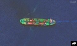 This image released by Maxar Technologies on Aug. 29, 2024, shows an overview of the Sounion oil tanker, which was recently attacked by Houthi rebels, on fire in the Red Sea.