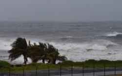 FILE - Hurricane Elsa approaches Argyle, St. Vincent, July 2, 2021.