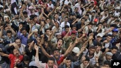 Anti-government protestors shout slogans, during a demonstration demanding the resignation of Yemeni President Ali Abdullah Saleh, in Sanaa, Yemen, July 10, 2011