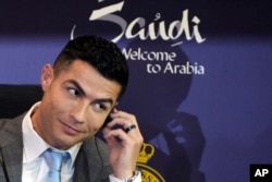 FILE - Soccer star Cristiano Ronaldo speaks during a press conference for his official unveiling as a new member of Al Nassr soccer club in in Riyadh, Saudi Arabia, Tuesday, Jan. 3, 2023. (AP Photo/Amr Nabil, File)