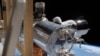 美国宇航员计划搭乘“龙飞船”返回地面