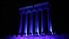 FILE - Part of the temples of Baalbek, a UNESCO world heritage site in Lebanon's eastern Bekaa Valley, illuminated in blue light, Oct. 24, 2015. 