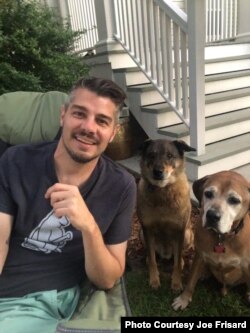 Joe Frisard with his dogs, Robert and Bruno. Frisard is a freelancer in New Orleans. He rents out a portion of his home through Airbnb, but the coronavirus pandemic has cut his income by more than 40%. (Photo Courtesy Joe Frisard)