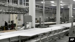 FILE - This April 2, 2012 file photo shows the fabrication room of the Northern Beef Packers processing plant in Aberdeen, S.D.