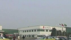 中国工人结束要求增加年底奖金的罢工