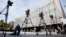 FILE - TV cameras stand outside the FIFA headquarters after a meeting of the FIFA Executive Committee in Zurich, Switzerland, Sept. 25, 2015.