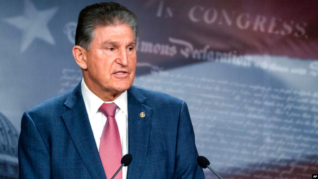 Sen. Joe Manchin, D-W.Va., speaks with reporters during a news conference on Capitol Hill, Nov. 1, 2021.