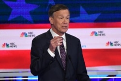 Democratic presidential hopeful former Governor of Colorado John Hickenlooper speaks during the second Democratic primary debate of the 2020 presidential campaign at the Adrienne Arsht Center for the Performing Arts in Miami, June 27, 2019.
