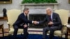 US President Joe Biden (R) meets with Slovenian Prime Minister Robert Golob in the Oval Office of the White House on October 22, 2024, in Washington, DC. (Photo by Drew ANGERER / AFP)