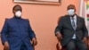 Ivory Coast's president Alassane Ouattara (R) and former president and opposition leader Henri Konan attend their first meeting since the national election in Abidjan on November 11, 2020. - Ivory Coast President Alassane Ouattara invited his chief…