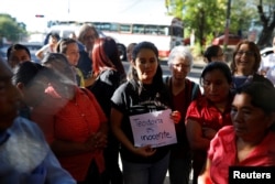 Supporters of Teodora Vasquez wait outside jail after Vasquez's 30-year sentence was commuted by El Salvador's Supreme Court, in Ilopango, El Salvador, Feb. 15, 2018.