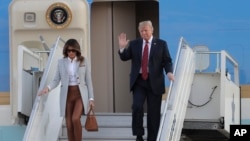 Američki predsjednik Donald Trump i prva dama Melania stižu na aerodrom u Helsinkiju, Finska, July 15, 2018. 