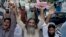 Supporters of anti-Indian group Jammatud Dawa rally against India, in Karachi, Pakistan, Oct. 10, 2014.
