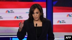 FILE - Democratic presidential hopeful U.S. Senator for California Kamala Harris speaks during the second Democratic primary debate of the 2020 presidential campaign at the Adrienne Arsht Center for the Performing Arts in Miami, June 27, 2019.