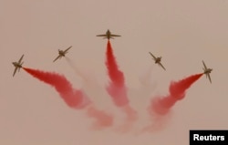 Jets perform during Saudi security forces' Abdullah's Sword military drill in Hafar Al-Batin, near the border with Kuwait April 29, 2014.