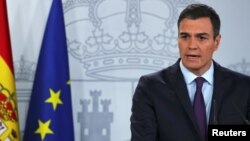 Spain's Prime Minister Pedro Sanchez delivers a statement on the political crisis in Venezuela at the Moncloa Palace in Madrid, Feb. 4, 2019. 