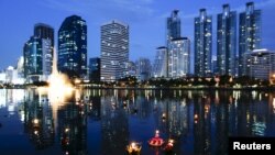 Krathongs floating at a pond are seen at a public park during the Loy Krathong festival in Bangkok, Thailand, November 25, 2015. A week after the festival, Thailand received a terrorist warning from Russia.