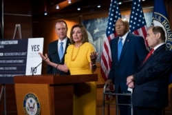 FILE - Speaker of the House Nancy Pelosi, D-Calif., speaks during a news conference after hearings with former special counsel Robert Mueller, on Capitol Hill in Washington, July 24, 2019.