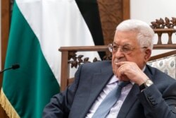 FILE - Palestinian President Mahmoud Abbas pauses while speaking during a joint statement with Secretary of State Antony Blinken, May 25, 2021, in Ramallah, West Bank.
