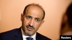 FILE - Ahmed Jarba, head of the Syrian National Coalition, at Bayan Palace, Kuwait.