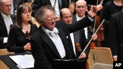 FILE - Music Director James Levine acknowledges the Symphony Hall audience in Boston, Mass., Oct. 2, 2010.