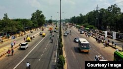 ছবিতে পশ্চিমবঙ্গের একটি মহাসড়ক দেখা যাচ্ছে। ছবি সৌজন্য: Adobe Stock. 