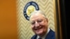 FILE - Former Vice President Walter Mondale smiles as he gets on an elevator on Capitol Hill in Washington, Jan. 3, 2018.