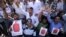 Activists of People’s Democratic Party shout slogans during a protest in Jammu, India, September 19, 2012. 