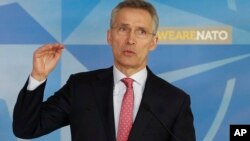 Sekjen NATO Jens Stoltenberg memberikan pernyataan di Brussels, Belgia. 