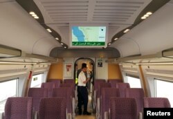 Saudi people are seen inside the new Haramain speed train in Jeddah, Saudi Arabia, Sept. 18, 2018.