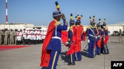 Members of the Presidential Guard gather to form up during the ceremony marking the end of France's presence in Chad and the Sahel at the Adji Kossei Air Base in N'Djamena, Jan. 31, 2025.