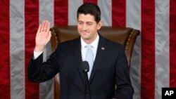 Newly elected House Speaker Paul Ryan of Wisconsin takes the oath of office in the House Chamber on Capitol Hill in Washington, Oct. 29, 2015. 