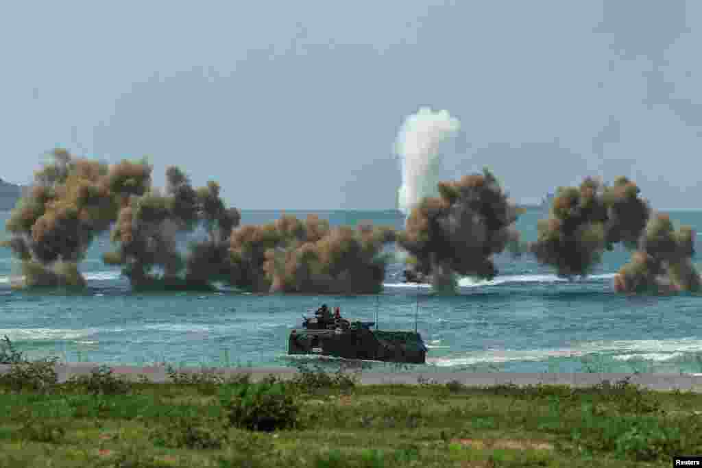 Smoke rises from an amphibious assault vehicles (AAV) participating in the &quot;Cobra Gold 2025&rdquo; (CG25) joint&nbsp;military&nbsp;exercise at a&nbsp;military&nbsp;base in Chonburi province,&nbsp;Thailand.