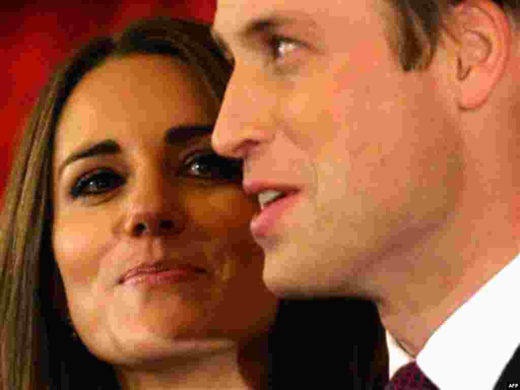 Nov 16: Britain's Prince William and his fiancee Kate Middleton pose for the media at St. James's Palace in London after announcing their marriage. The couple are to wed in 2011.(AP Photo/Sang Tan)