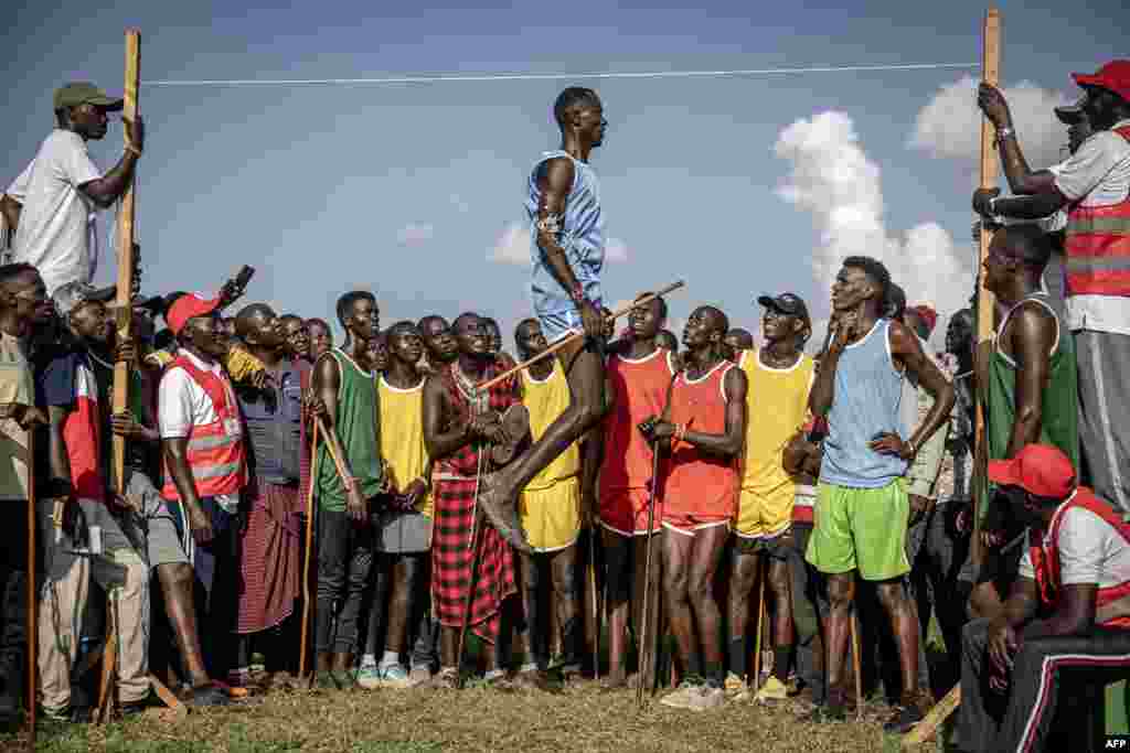 A Maasai athlete competes in the men's traditional Maasai jumping competition during the Maasai Olympics 2024 in Kimana, Kenya, Dec. 14, 2024. 