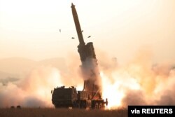 This undated picture released by North Korea's Central News Agency on Oct. 31, 2019, purportedly shows the launch of projectiles that landed in the sea between the Korean Peninsula and Japan.