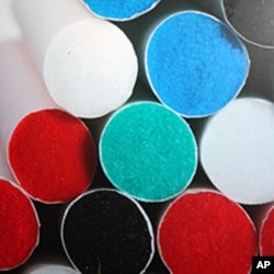 Colored cigarette filters on display at the World Tobacco Asia 2010 exhibition in Jakarta