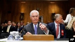Secretary of State Rex Tillerson takes his seat on Capitol Hill in Washington, June 13, 2017, prior to testifying before the Senate Foreign Relations Committee.