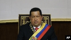 Venezuela's President Hugo Chavez attends a special session at the National Assembly commemorating the country's Independence Day, in Caracas, Venezuela, July 5, 2012. 