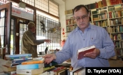 Second hand book dealer Doron Locketz sometimes makes "big money" selling rare used books.