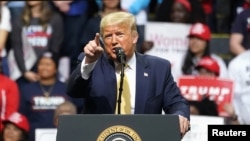 FILE - U.S. President Donald Trump holds a campaign rally in Colorado Springs, Colorado, Feb. 20, 2020.