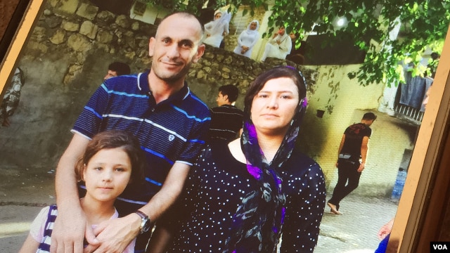 Yazidi activist, Khaleel al-Dakhi, with two Yazidi sisters that he went to great lengths to rescue, Alia, age 20 and Zeena. (Sharon Behn/VOA)