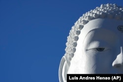 A close-up of the 30-foot statue of the Buddha – one of the largest in the United States -- at the New Jersey Buddhist Vihara and Meditation Center in Franklin Township, N.J. on Tuesday, Nov. 12, 2024. (AP photo/Luis Andres Henao)