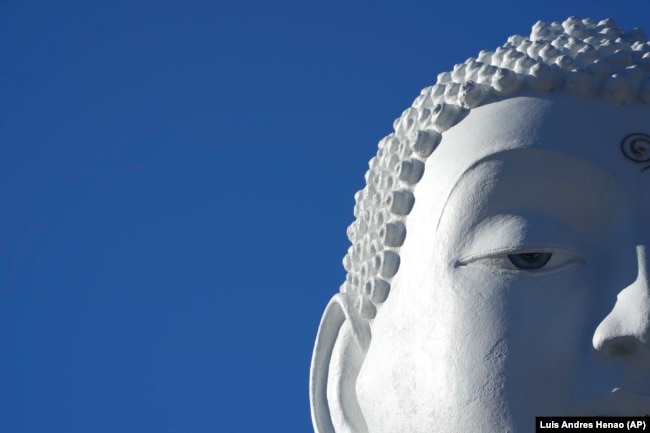 A close-up of the 30-foot statue of the Buddha – one of the largest in the United States -- at the New Jersey Buddhist Vihara and Meditation Center in Franklin Township, N.J. on Tuesday, Nov. 12, 2024. (AP photo/Luis Andres Henao)